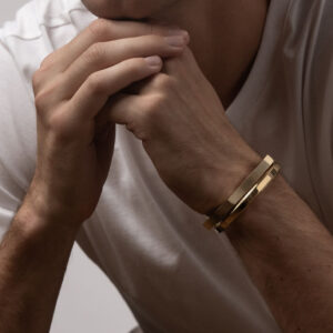 Men’s golden bracelet with sleek modern design.